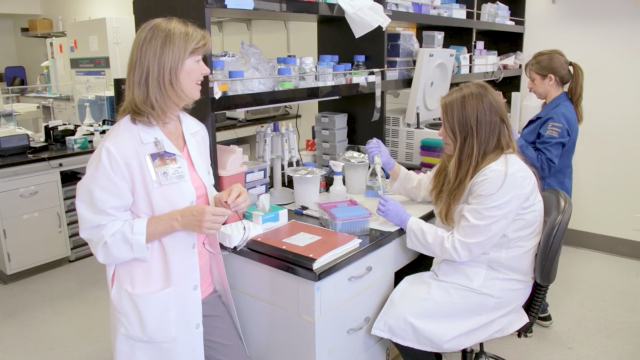 Dr. Demer and physician scientists in a lab