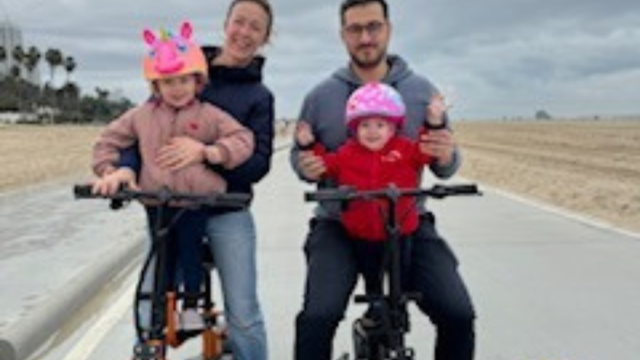 Amelia Delaporte, MD and family on bicycles 