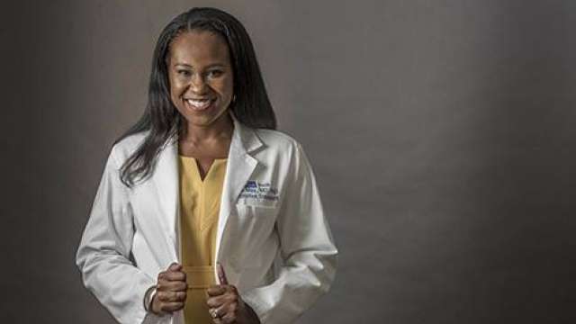 Dr. Fola May