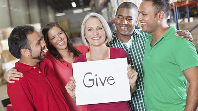 Workers joining together to support cancer research