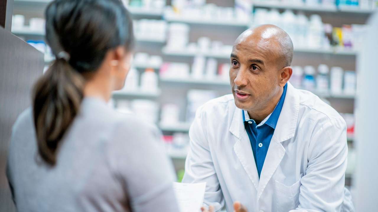 Pharmacist and patient