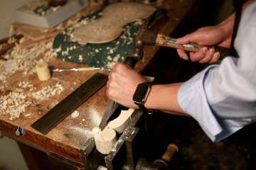 When he's not studying the brain, neursurgeon Dr. Daniel Lu is crafting world-class violins. (Photo by Anne Johansson)