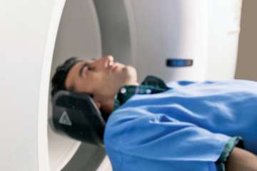 Patient entering a PET scan