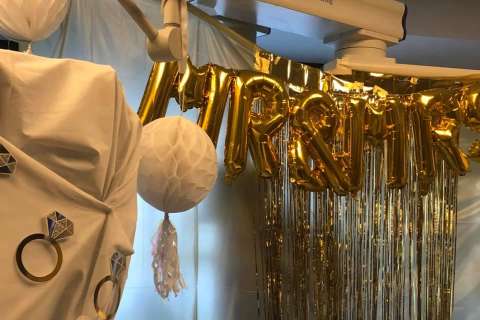 A hospital room transformed for a wedding