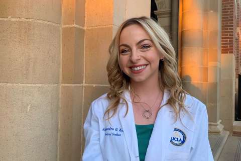 UCLA medical student in white coat