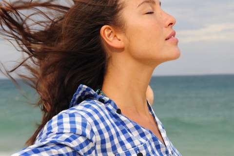 Female at beach near ocean