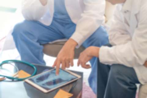 Doctors looking at x-ray
