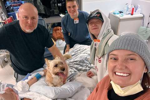 "Stacy Estrella with husband Ryan, son Ethan, daughters Chloe and Emily, and dog Riley fulfilling her third wish.