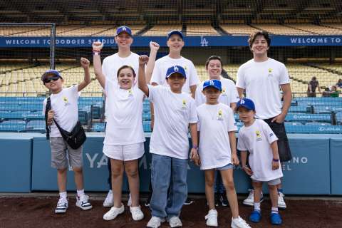 Pediatric cancer survivors and patients on the field at Dodger Stadium