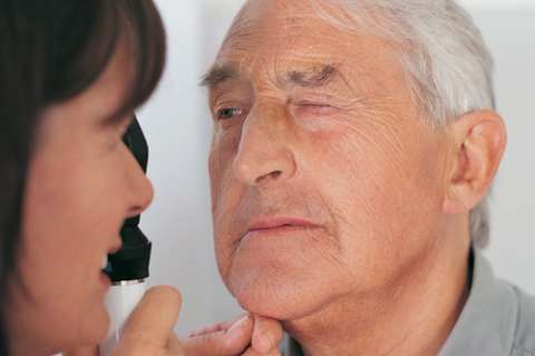 Older man receiving an eye exam