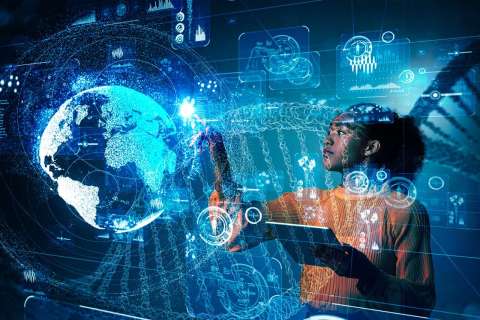 A young woman holding a tablet and touching a digital screen with a lot of stats.