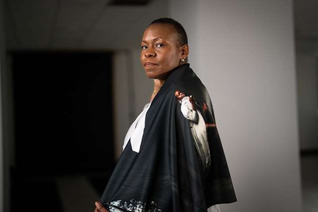 Woman wearing cape