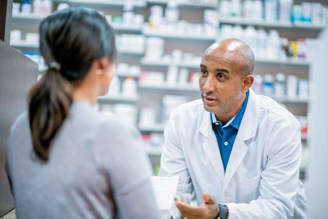 Pharmacist and patient