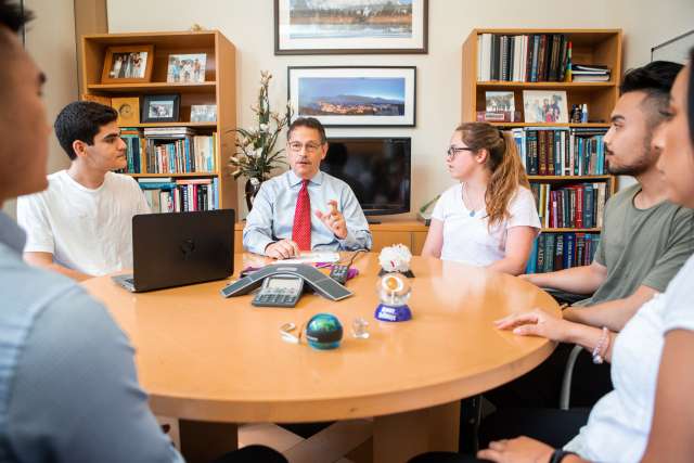 Dr. Donald Kohn meeting with students