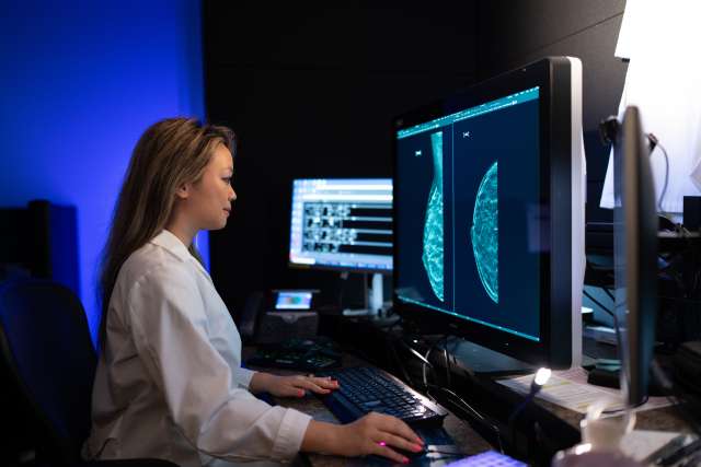 UCLA Health radiologist Dr. Tiffany Chan reviews a mammogram. 