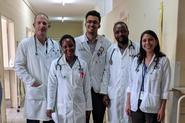 Dr. Chris Buck with Karen Ramos and Gabriel Mendoza, UCLA David Geffen School of Medicine students, and Luisa Lambo and Aneslmo Lisboa, Mozambican residents, at Hospital Central de Maputo.
