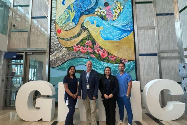 Guam Regional Medical Center team members pose for a photo.