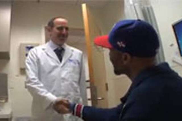 Dr. Robert Reiter greeting his patient.