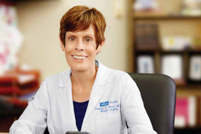 Dr. Deanna Attai, UCLA Health breast surgeon, wearing white lab coat