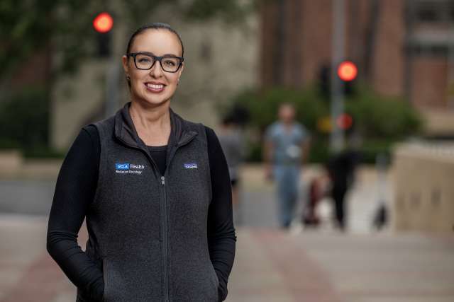 Nurse Kayla Kafka-Peterson poses for a portrait outside the medical center offices in Westwood