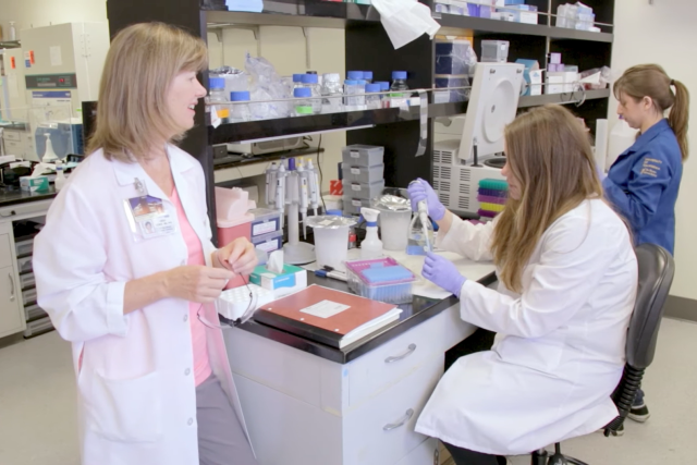 Dr. Demer and physician scientists in a lab