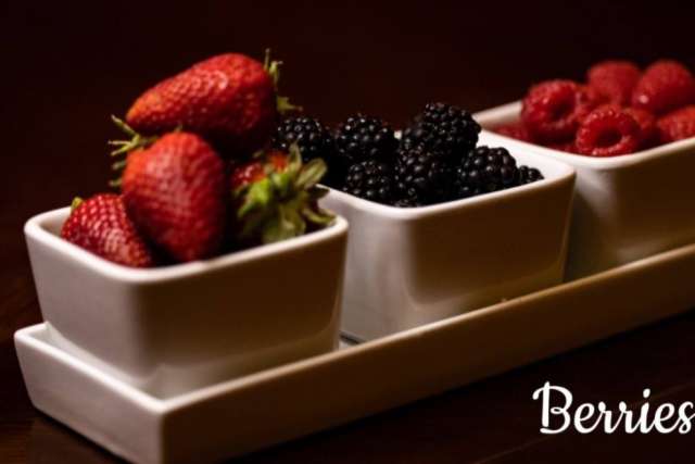 strawberries, blackberries, and raspberries in ramekins