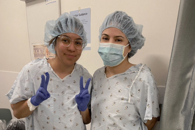 Karina, right, received a life-saving kidney from her sister, Rosa, left, in October 2023; both are wearing hospital scrubs
