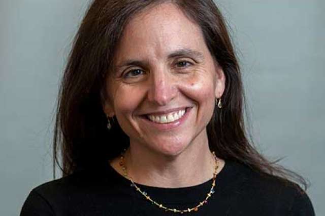 headshot of dr. Jessica Temple wearing a black blouse