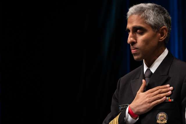 U.S. Surgeon General Vivek Murthy leads a contemplative exercise during the WOW 2023 Mental Health Summit at UCLA’s Royce Hall.