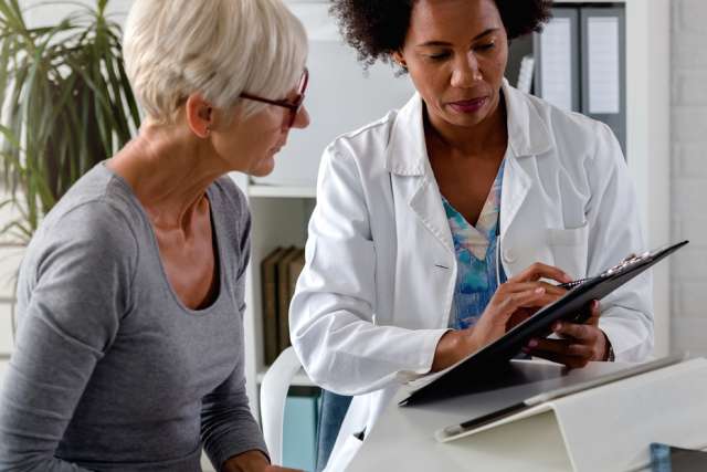Female patient and doctor