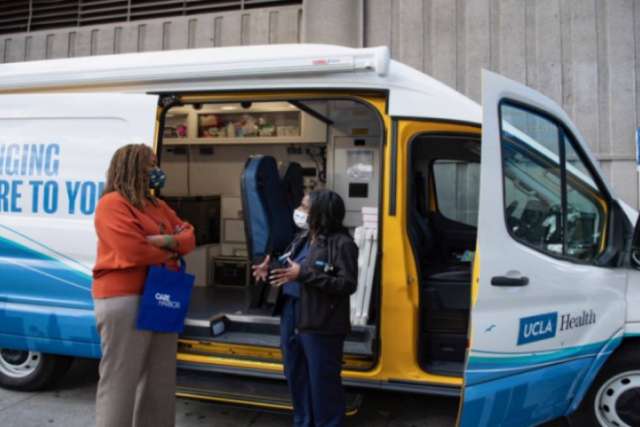 Dr. Medell Briggs-Malonson shows off the inside of a UCLA Health Homeless Healthcare Collaborate mobile clinic van