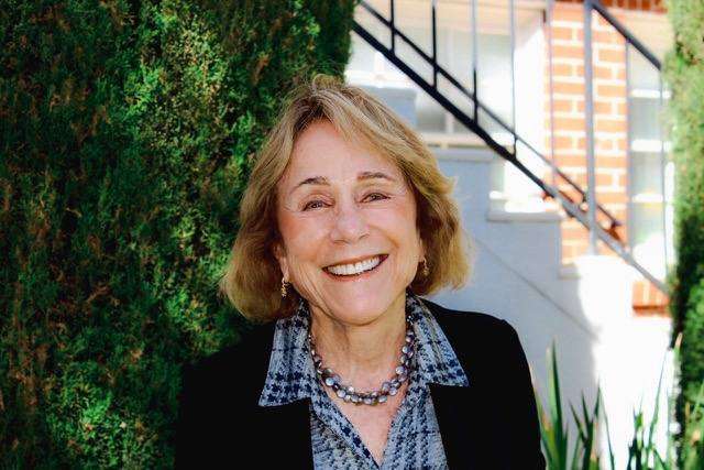 Jane Willens smiling and standing outdoors