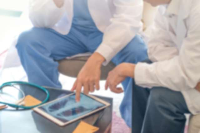 Doctors looking at x-ray