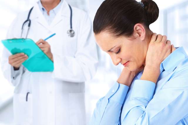 Head and neck cancer patient with doctor
