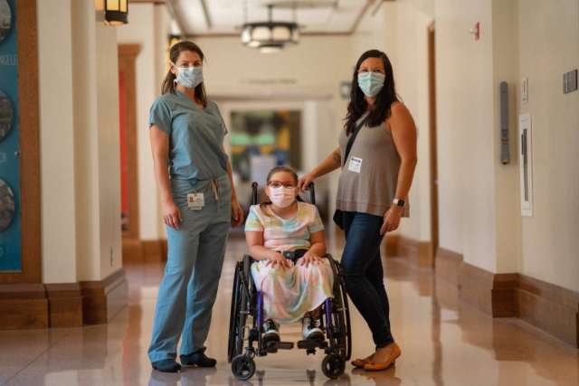Dr. Rachel Thompson, left, with Scarlett Ferguson and Scarlett's mom, Keri Ferguson.