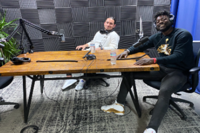 Dr. Daniel Rafie (l) and Brandon Bostick (r) prepare for the BrainSPORT podcast