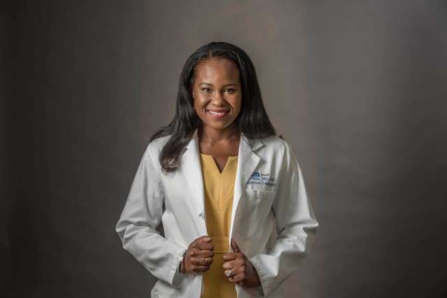 A portrait of Dr. Folasade May