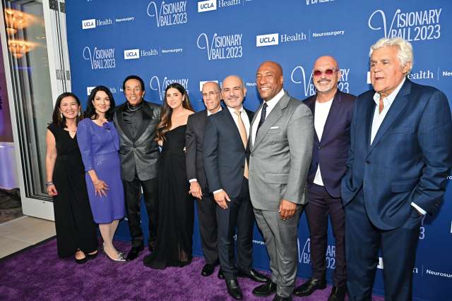 (From left) Dr. Linda Liau, Medical Visionary honoree Johnese Spisso, Smokey Robinson, Courage Award honoree Erika Kort, Jeffrey Katzenberg, Dr. Eric Esrailian, Visionary Award honoree Byron Allen, Howie Mandel and Jay Leno.