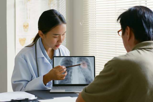 Doctor and lung cancer patient