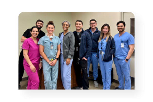 class of 2025 inside of a hospital wearing scrubs 
