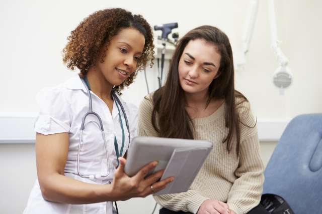 Doctor consults with a cancer patient