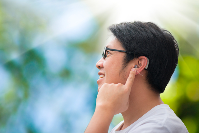 Man with a hearing aid