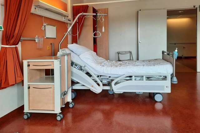 Empty hospital bed
