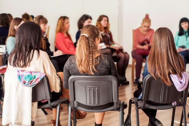 women in a circle support group style