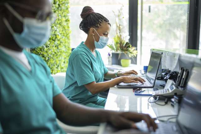 Nurse working at desk