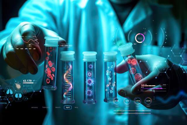 Lab researcher holding vials full of cells and DNA strands