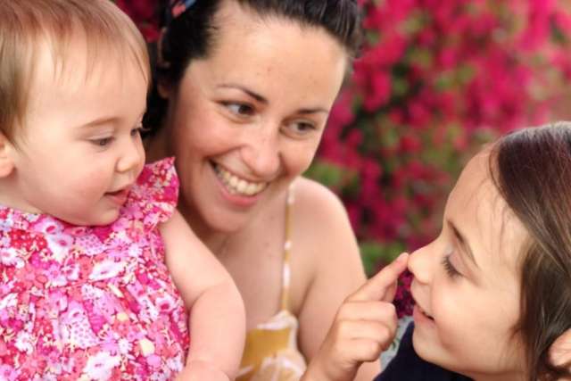 Christelle Jorda outside with her two children