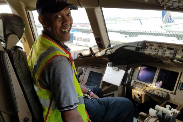 Herbert Williams in an airplane cockpit.