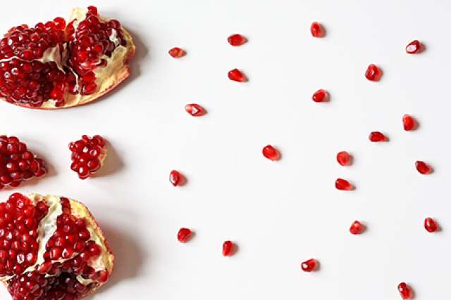 Closeup photo of sliced pomegranate