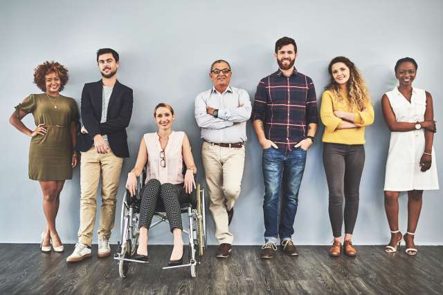 Diverse group of people standing together